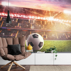 Ein Fototapete mit einem dynamischen Bild eines Fußballstadions in einem Wohnzimmer.
