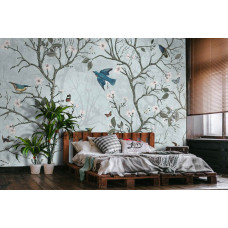 Eine Fototapete mit japanischen Vögeln in einem Blütenwald mit Kirsch- und Apfelblüten für das Wohnzimmer.