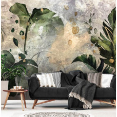 Eine kunstvolle Fototapete mit botanischen Blättern im farbenfrohen Dschungel-Look für das Wohnzimmer.