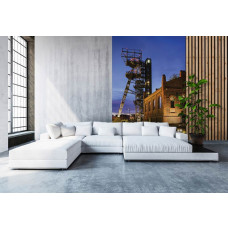 Eine Fototapete mit einem historischen Museum in Kattowitz, ideal für ein stimmungsvolles Wohnzimmer.