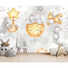 Eine Fototapete mit Häschen in den Wolken mit Sternen und Mond in einem Babyzimmer.
