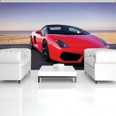Eine Fototapete mit einem roten Lamborghini am Meer und Strand für das Wohnzimmer.