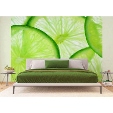 Eine Fototapete mit Limettenscheiben, die einem Schlafzimmer einen erfrischenden und lebendigen Look verleiht.