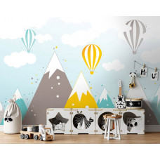 Eine Fototapete mit Heißluftballons über Berggipfeln für Kinder im Spielzimmer.