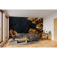 Fototapete mit botanischem Blattmotiv in Gold auf dunkler Textur im Wohnzimmer.