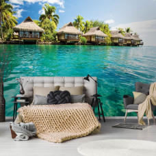 Eine Fototapete mit einer sonnigen Malediven-Scčne, geeignet für das Schlafzimmer.