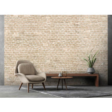 Eine Fototapete mit Ziegelmauerwerk im Industriedesign, perfekt für ein Wohnzimmer.