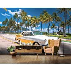 Fototapete Miami Vibes im Wohnzimmer mit Oldtimer und strahlend blauem Himmel.