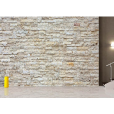 Fototapete mit einer modernen Backsteinwand in einem Wohnzimmer.