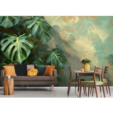 Eine Fototapete mit Monstera-Blättern im urbanen Dschungel-Stil in einem Wohnzimmer.