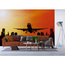 Ein Fototapet von einem Nachtflug mit einem Flugzeug, das startet, in einem Wohnzimmer mit Vliesbehang.