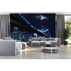 Eine Fototapete der kultigen Brooklyn Bridge bei Nacht für das Wohnzimmer.