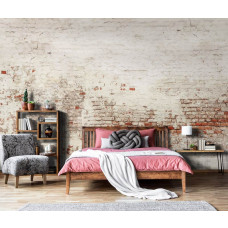 Eine Fototapete mit einer alten Backsteinmauer im Industriedesign, perfekt für ein Schlafzimmer.