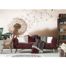 Eine Fototapete mit einer Pusteblume im Wind in Sepia im Wohnzimmer.