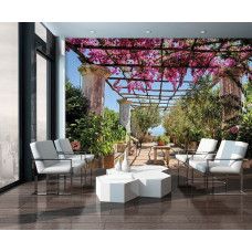 Eine Fototapete einer Blumen-Pergola mit 3D-Effekt in Tunnelform.