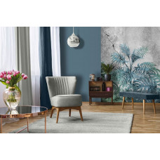 Eine industrielle Fototapete von Pflanzen auf einer Betonwand mit grünem Dschungel-Look im Wohnzimmer gesehen.