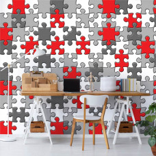 Eine Fototapete mit bunten Puzzleteilen, ideal für ein Kinderzimmer.