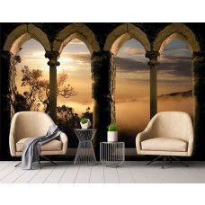Eine Fototapete mit einem Blick durch römische Säulen und Fenster, mit einer Landschaft im Wohnzimmer.