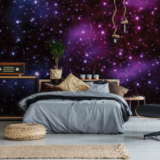 Eine Fototapete mit einem kosmischen Design aus Sternen und Planeten, ideal für ein Schlafzimmer.