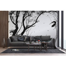 Ein Fototapet von einem Silhouett eines Waldes mit einem Vogel im Wind in einem Wohnzimmer mit Vliesbehang.