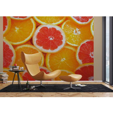 Eine Fototapete von Orangenscheiben Obst in einem Wohnzimmer mit Airtex.