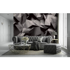 Eine Fototapete mit einem abstrakten Design aus schwarz-grauen Steinen in geometrischen Mustern für das Wohnzimmer.