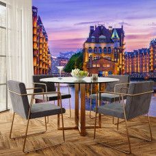 Fototapete Speicherstadt Hamburg im Abendlicht in der Küche mit beleuchteten Lagerhäusern und warmem Stadtlicht.