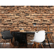 Eine industrielle Fototapete einer Steinwand im Wohnzimmer.