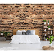 Eine industrielle Fototapete einer Steinwand im Schlafzimmer.