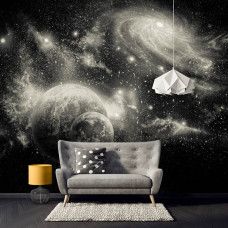 Eine Fototapete mit Sternen und Planeten in einem Weltraumthema, perfekt für ein Schlafzimmer und Wohnzimmer.