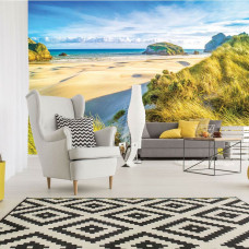 Eine Fototapete mit Sandstrand, Meer und Dünen in einer natürlichen Landschaft für das Wohnzimmer.