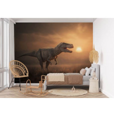 Fototapete T-Rex in der Abendsonne in einem Kinderzimmer mit einem mächtigen Dinosaurier vor einem orangefarbenen Himmel.