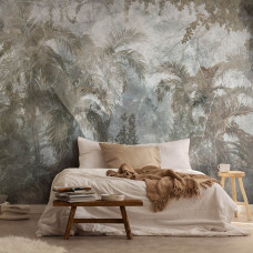 Eine Fototapete mit tropischer Wildnis und Dschungelpflanzen vor einem Betonhintergrund im Schlafzimmer.