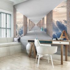 Eine Fototapete mit Wolkenansicht in einem Tunnel mit 3D-Effekt für das Wohnzimmer.