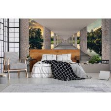 Eine Fototapete mit einem Tunnel mit Seeblick in 3D-Effekt.