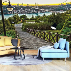 Fototapete mit Blick auf eine Stadt und Brücke in einer Landschaft für das Wohnzimmer.