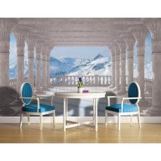 Eine Fototapete von Bergen mit Schnee und blauem Himmel.