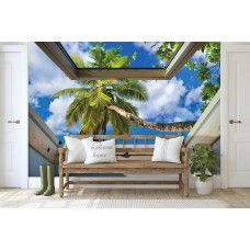 Eine Fototapete mit einer tropischen Landschaft mit Palmen für das Schlafzimmer.