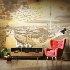 Eine Fototapete mit einer Vintage-Stadtkulisse von Berlin in einem Wohnzimmer.