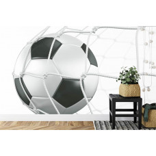 Fototapete mit einem starken Bild eines Fußballs im Tor in einem Kinderzimmer.