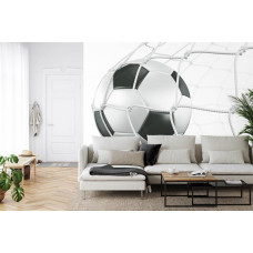 Fototapete mit einem starken Bild eines Fußballs im Tor in einem Wohnzimmer.