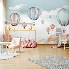 Eine Fototapete mit fröhlichen Heißluftballons für Kinder in einem Mädchenzimmer in einem Kinderzimmer.