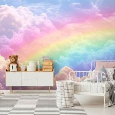 Fotobehang met een regenboog en roze wolken aan de muur van een vrolijke kinderkamer.