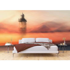 Eine Fototapete mit einem Leuchtturm im Abendlicht in einem Schlafzimmer.