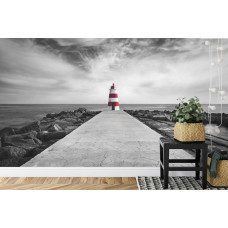 Ein Fototapete mit einem ikonischen Leuchtturm an einem Strand in Portugal, perfekt für ein Büro.