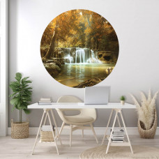 Ein Wandkreis mit einem Wasserfall in einem Herbstwald, perfekt für eine Büroumgebung.