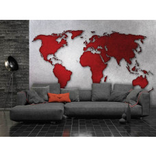 Eine Fototapete mit einer Weltkarte auf einem Betonhintergrund, geeignet für ein Wohnzimmer.