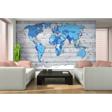 Eine Fototapete mit einer abstrakten Weltkarte auf hölzernem Hintergrund.