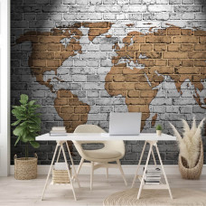 Eine Fototapete mit einer künstlerischen Darstellung einer Weltkarte in Gold und Grau.