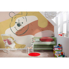 eine Fototapete von Winnie the Pooh mit Honig, Disney-Thema, sichtbar in einem Babyzimmer.